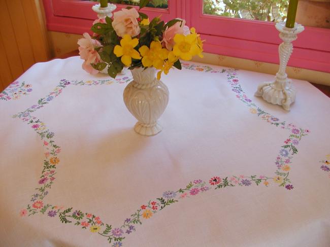 Really romantic tablecloth with hand-embroidered crown of summer flowers