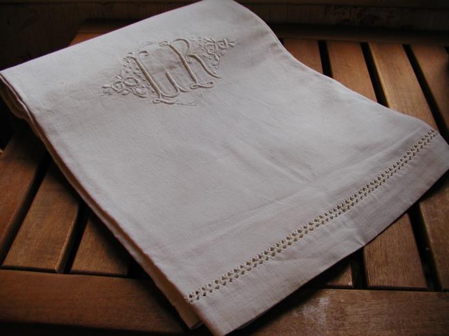 A pair of sheets with embroidered monogramm LR