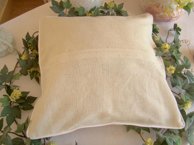 Romantic cushion cover with hand-embroidered crown of roses in ribbon