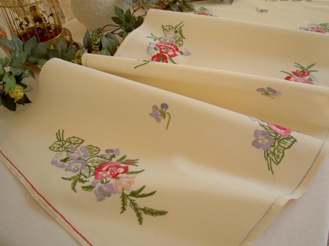Romantic table runner with hand-embroidered sweet peas