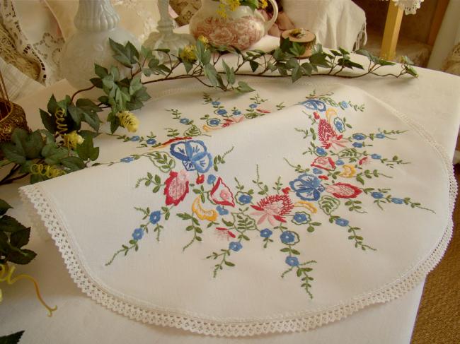 Gorgeous table centre with hand-embroidered flowers and lace edging