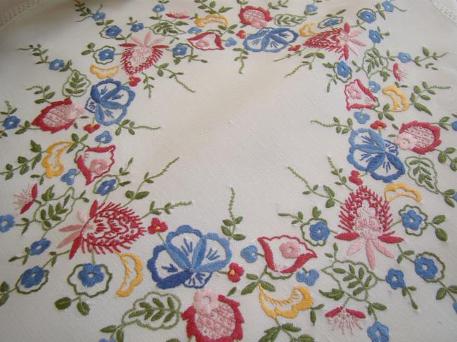Gorgeous table centre with hand-embroidered flowers and lace edging