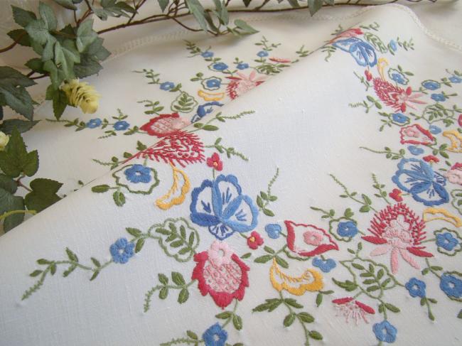 Gorgeous table centre with hand-embroidered flowers and lace edging