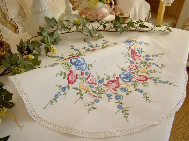 Gorgeous table centre with hand-embroidered flowers and lace edging