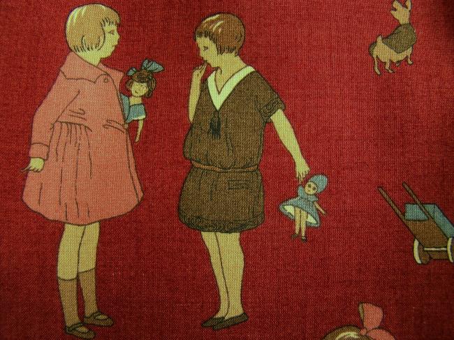 Coupon de coton à fond rouge, impression petites filles et jouets (Moda)