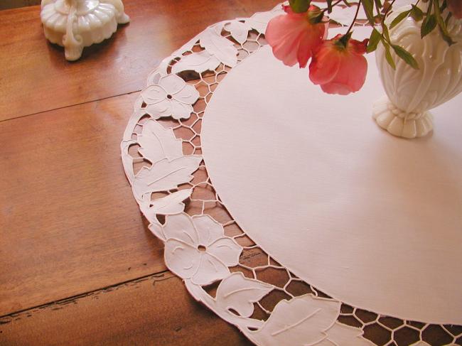 Gorgeous table centre with Richelieu openwork with stylish flowers and foliage