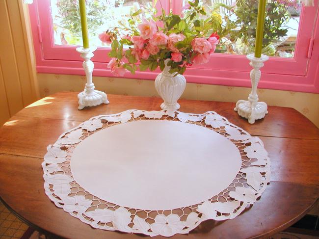 Gorgeous table centre with Richelieu openwork with stylish flowers and foliage