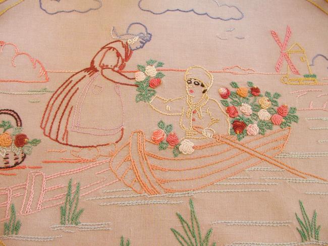 Adorable table centre with hand-embroidered lady in a boat in Holland