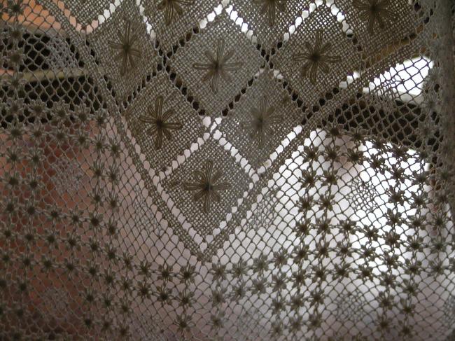 Stunning filet lace tablecloth entirely hand made.