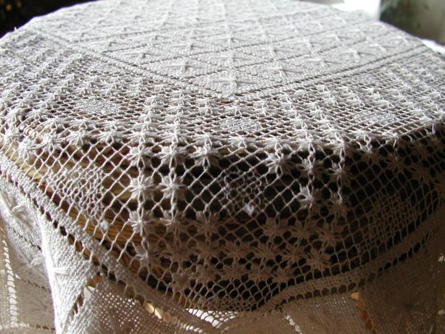 Stunning filet lace tablecloth entirely hand made.