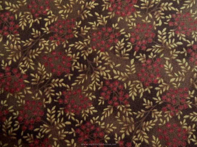 Coupon de coton à fond marron foncé avec motif de petites fleurs rouge rouille