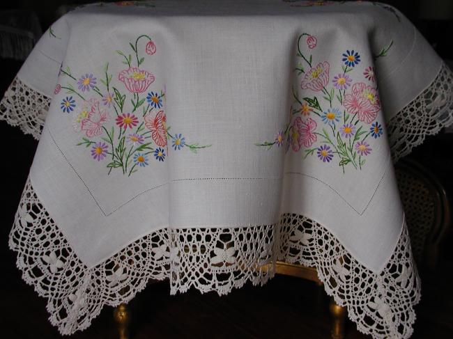 Stunning tablecloth with  embroidered flowers and Cluny lace.