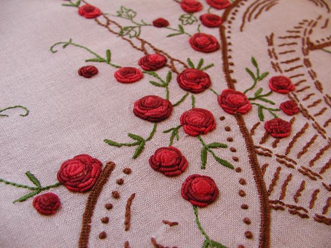 Really beautiful oval table centre with embroidered basket of red roses