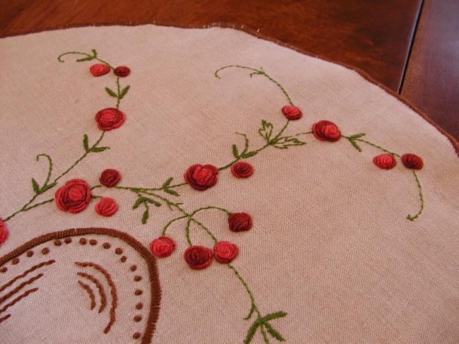 Really beautiful oval table centre with embroidered basket of red roses
