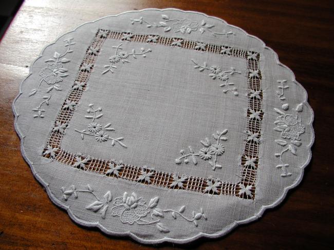 Charming little pina round doily with lovely hand embroidered flowers in silk.