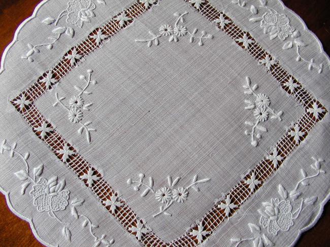 Charming little pina round doily with lovely hand embroidered flowers in silk.