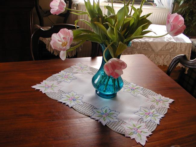 Lovely couple of table mats with brightful colors embroidered flowers