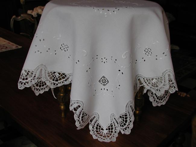 Gorgeous tablecloth with embroidered garland of flowers and Cluny lace.