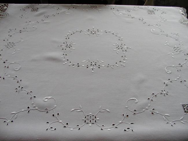 Gorgeous tablecloth with embroidered garland of flowers and Cluny lace.