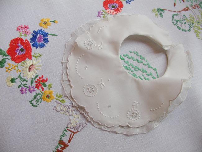 Adorable double baby bib with hand embroidered flowers and net lace