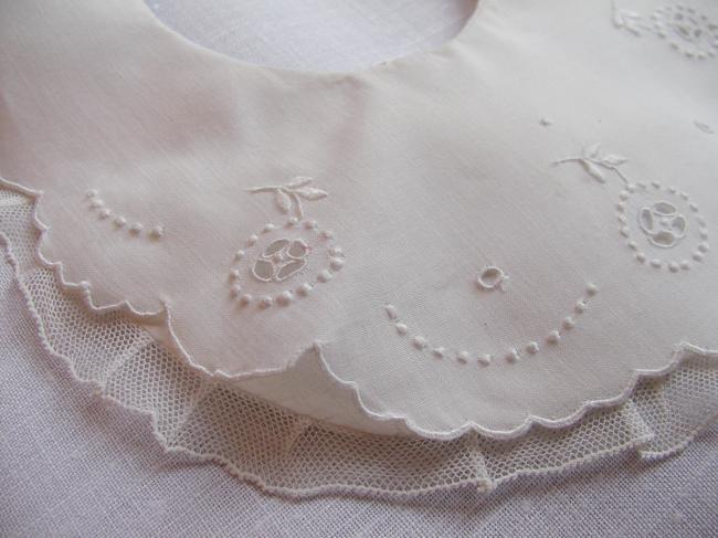 Adorable double baby bib with hand embroidered flowers and net lace