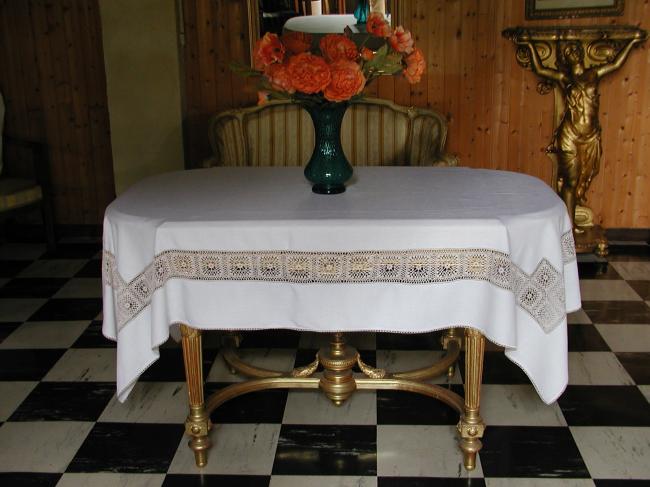 Really pretty tablecloth with inserts of crochet lace