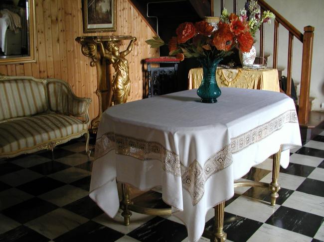 Really pretty tablecloth with inserts of crochet lace