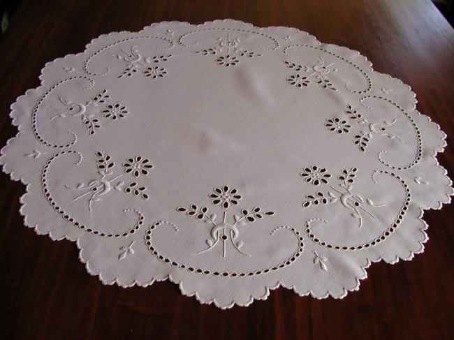 Gorgeous broderie anglaise table centre with bunches of flowers