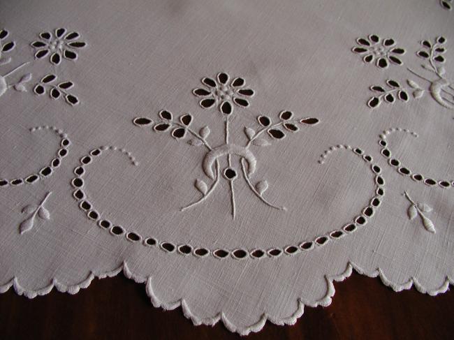Gorgeous broderie anglaise table centre with bunches of flowers