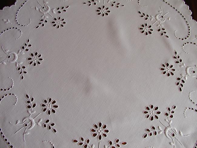 Gorgeous broderie anglaise table centre with bunches of flowers