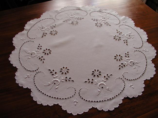 Gorgeous broderie anglaise table centre with bunches of flowers