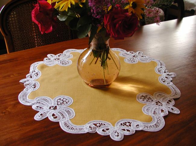 Stunning mustard table centre with battenburg tape lace edging