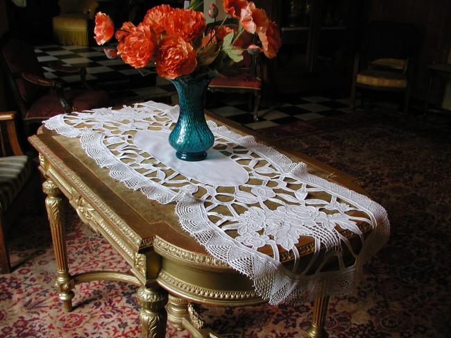 Exceptional table runner with baskets of flowers, lots of cutworks