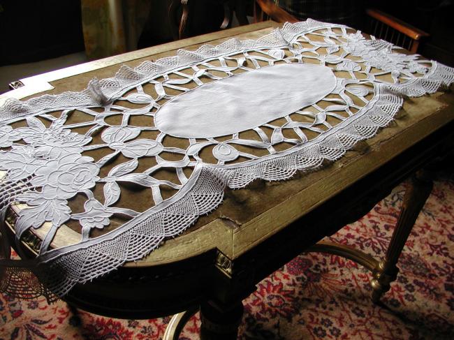 Exceptional table runner with baskets of flowers, lots of cutworks