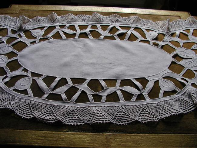 Exceptional table runner with baskets of flowers, lots of cutworks