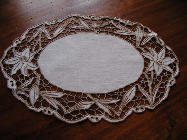 Lovely oval doily with embroidered lilies in Madeira