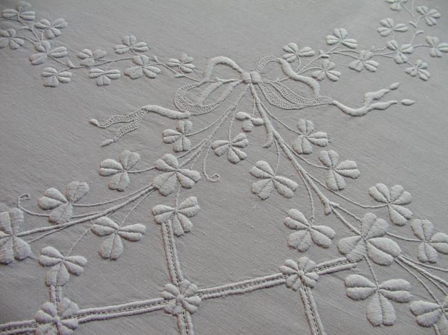 Exceptional wedding bed spread with abondance of embroidery of clovers.