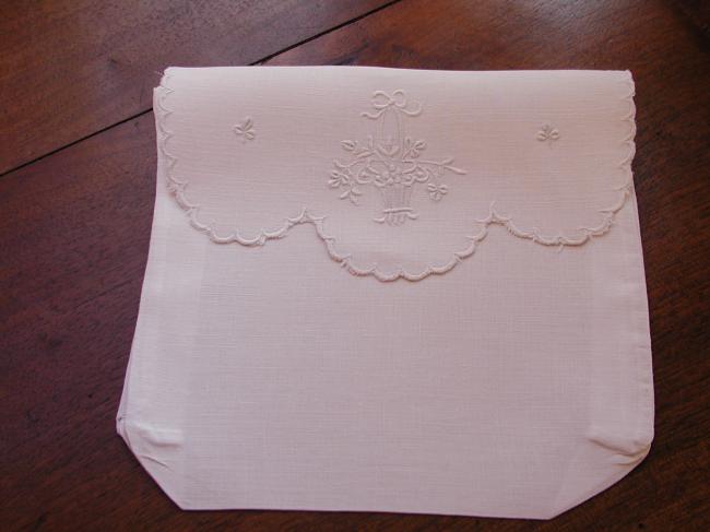 Gracious handkerchief case with an embroidered basket of flowers