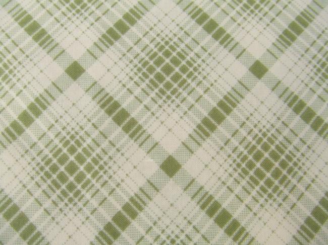 Coupon de coton à fond écru avec motif quadrillé vert tilleul